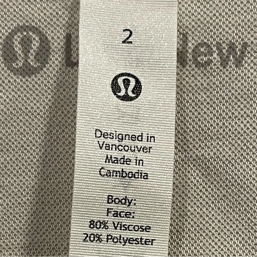 Lululemon sleeveless V neck top  Size 2 Color Cream